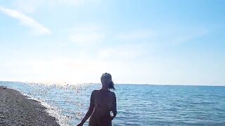 Naked on the beach